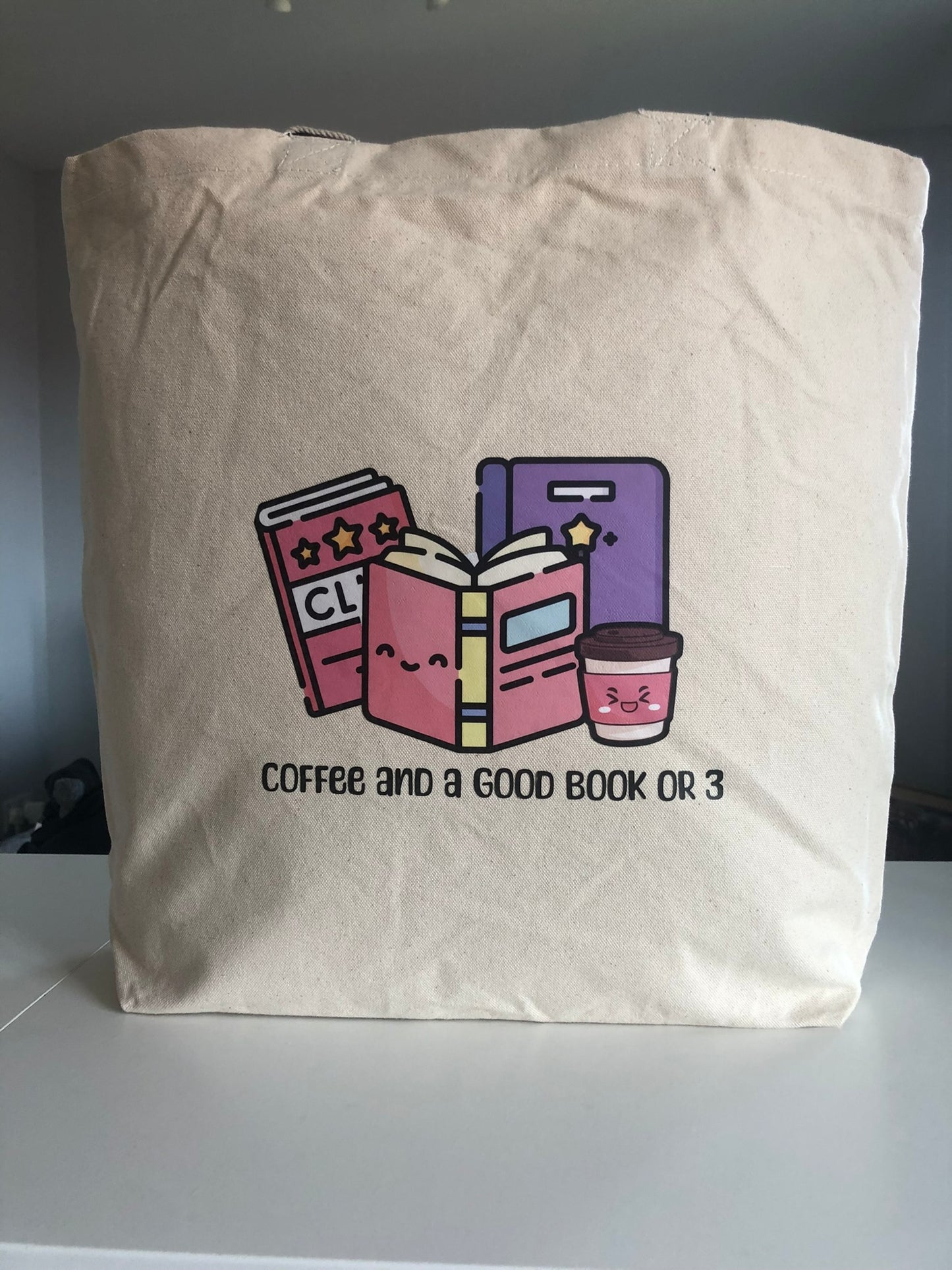 Coffee and a Good Book or 3 Tote Bag